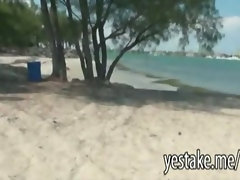 Two girlfriends on beach spied on by guy and they suck his dick