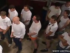 Hot brunette sucking old cock while others wait in line