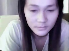 Shy & horny Thai girl fingering on webcam